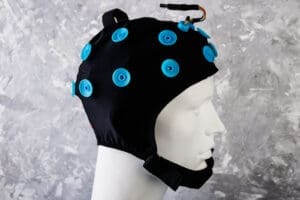 EEG electrodes attached to model  head. EEG headset equipment close up