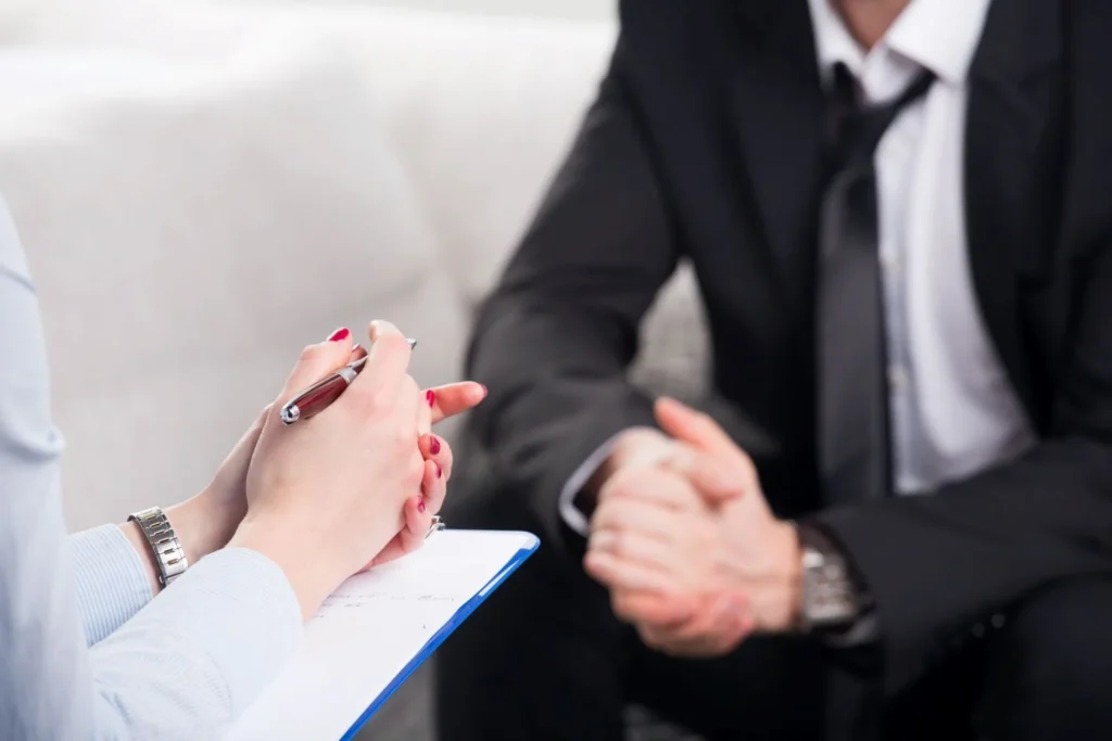 Professional man in a therapy session at the office of Ginny Estupinian PhD Psychologist Los Gatos