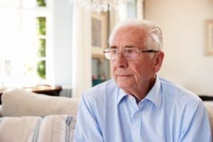 photo of older adult suffering from depression. The office of Ginny Estupinian Phd, Geriatric psychologist provides therapy for older adults with depression