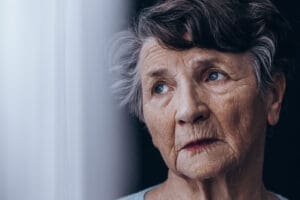Picture of a Depressed older woman due to grief