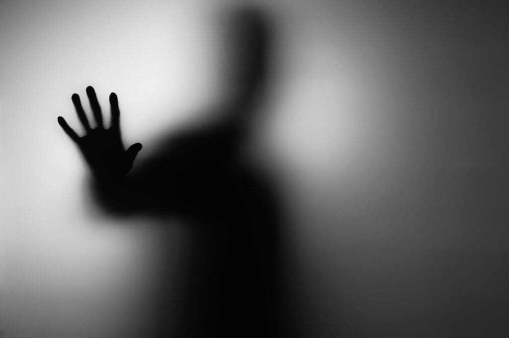 Photo of a blurred figure to represent ghosting in relationships