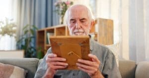  Photo of older adult dealing with grief. Ginny Estupinian PhD, geriatric psychologist treats older adults suffering from grief. 
