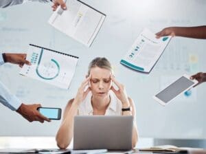 Photo of a woman trying to do it all and suffering from anxiety.