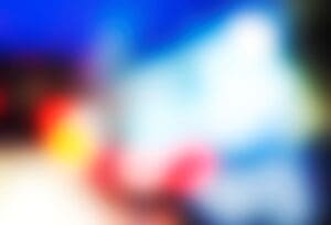 Abstract blurred image of a first responder, symbolizing how Dr. Ginny Estupinian, PhD, provides specialized treatment for PTSD and trauma