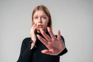 Woman experiencing relationship crisis receiving support for domestic violence and emotional distress from Ginny Estupinian, PhD